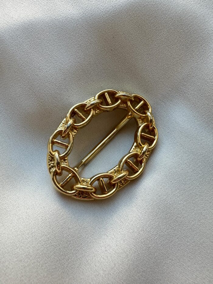 Ferma foulard/sciarpa con maglia marinara - immagine 1